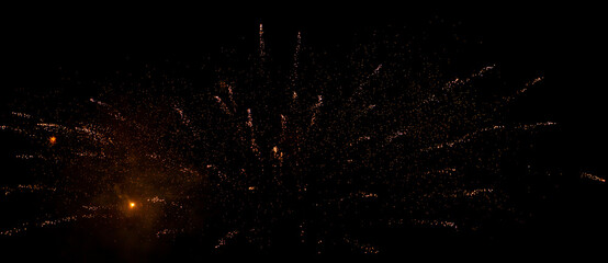 Abstrakte Funken von einem Silvester Feuerwerk für Hintergründe