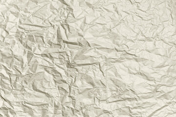 Crumpled paper ivory color texture. Abstract background. Mockup for your design.
