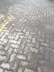 Hazard-prone courtyards are made of old, worn-out bricks.