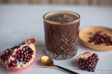 Coffee with pomegranate juice