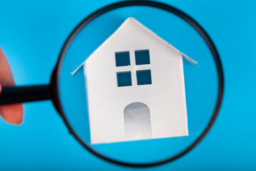 House under a magnifying glass