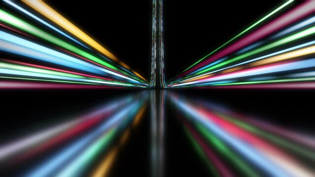A colorful digital data stream abstract over a black background. Blurry reflection in the floor.
