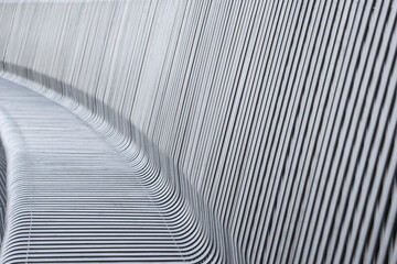 rows of even metallic gray stripes close-up.