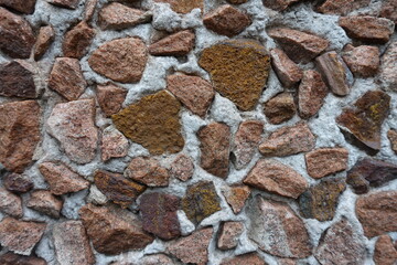 Backdrop - multicolored gravel pebble dash on the wall