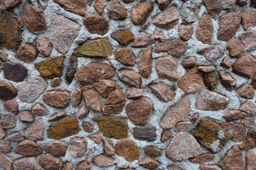 Background - multicolored gravel pebble dash on the wall