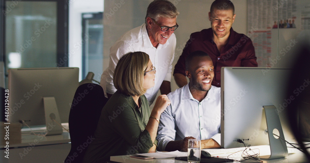 Poster there's no team better. cropped shot of a group of businesspeople working together on a computer in 