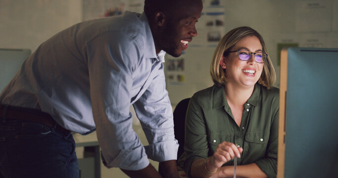 This looks great. Cropped shot of two businesspeople working together on a computer in their office.