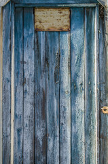 Vintage wooden background with faded peeling paint. Old wooden painted texture surface.