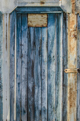Vintage wooden background with faded peeling paint. Old wooden painted texture surface.