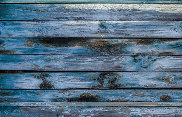Vintage wooden background with faded peeling paint. Old wooden painted texture surface.