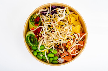 Traditional Hawaiian dish of fresh salmon, rice, vegetables and fruits. Studio Photo