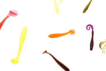 Multicolored silicone baits isolated on white background. Studio photo.
