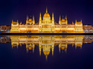 Fototapeta na wymiar Hungarian Parliament building at night with reflection in Danube river, Budapest, Hungary