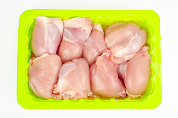 Pieces of chicken thigh meat without skin and bone. Studio Photo