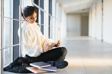 beautiful indian university student. The concept of higher education.