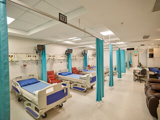 Photographs of hospital interiors, general rooms and medical supplies.