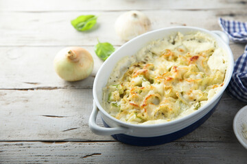 Homemade onion and cauliflower bake with cheese