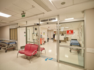Photographs of hospital interiors, general rooms and medical supplies.