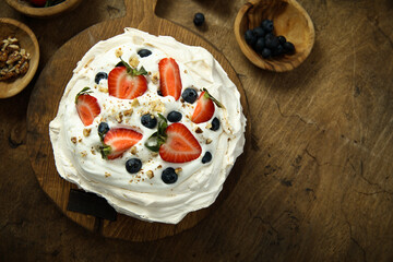 Pavlova meringue dessert with fresh berries