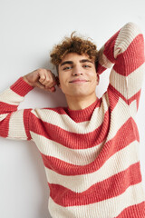 Attractive man hand gesture posing fun light background