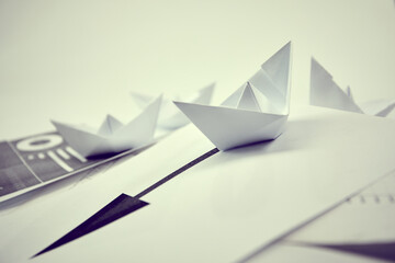 business concept, paper boats on the documents