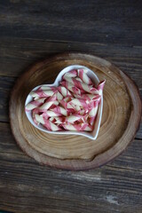 Colorful Italian pasta background. Various colors of  tie farfalle pasta. Selective focus. noodles