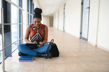 portrait of happy female african american college student