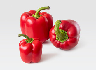 Bright red bell peppers with thick green cuttings