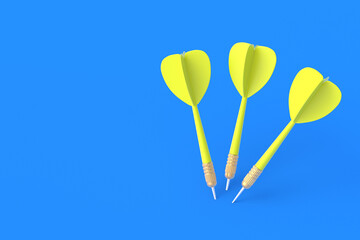 Toys for adults and children. Game for leisure. International tournament, competitions. Yellow darts on a blue background. Copy space. 3D rendering