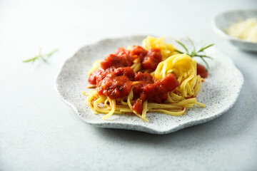 Pasta with tomato sauce and roseamry