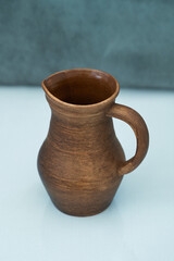       Ceramics, a ceramic product made with your own hands, made on a potter's wheel, a jug, a mug, clay.       