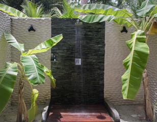 An amazing outdoor shower near the ocean on an exotic tropical island.  Maldives. A heavenly place...
