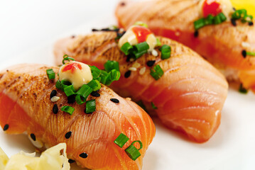 Various sushi rolls on white background. With copy space for text. Top view. Japanese food restaurant sushi maki roll plate. delicious seafood sushi at a Japanese restaurant