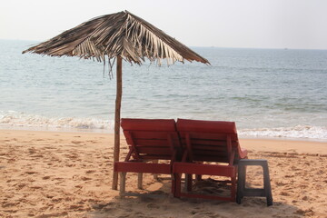 beach chairs and umbrella