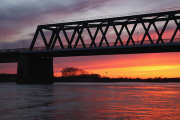 The railway bridge in Deventer, the Netherlands, at sunset
