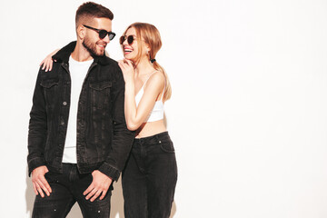 Sexy smiling beautiful woman and her handsome boyfriend. Happy cheerful family having tender moments.Young passionate couple hugging before having sex. Sensual pair getting closer for kiss. Isolated