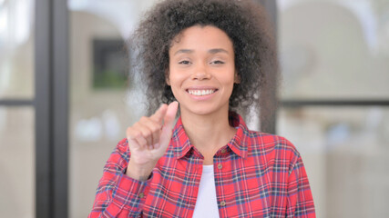 Portrait of African Woman Pointing at the Camera
