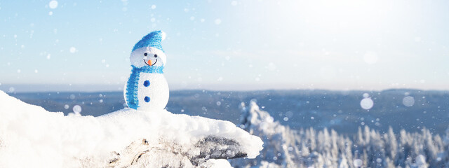 Winter snow snowman background panoramic banner panorama - Little cute Snowman sits on branch of...