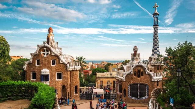 Barcelona, Spain, time lapse view of historical landmark Park Guell and Barcelona cityscape during summer.	
