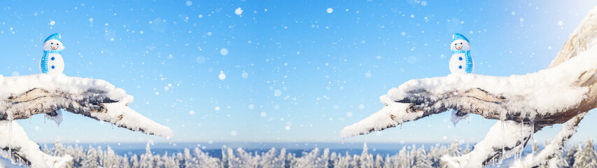 Winter snow snowman background panoramic banner panorama - Little cute Snowmen sits on branch of...