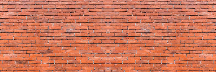 Old vintage retro style red bricks wall for abstract brick background and texture.