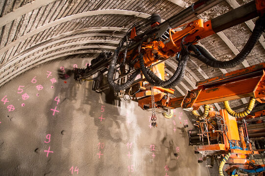 Geneva, Switzerland - May 22, 2014: A big machine inside a tunnel construction site used for the construction of piperoof grouting in tunneling
