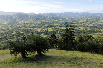 Fototapeta na wymiar Dominican landscape. Mountains, hills, farmland, and plains. Dominican Republic.
