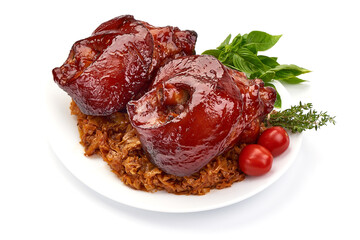 Roasted ham hock with sauerkraut, isolated on white background.