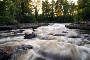 Morrum Salmon river known among fishing enthusiasts around the world because of the salmon fishing. Long exposure during golden hour.