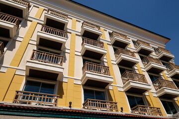 Building facade with many identical balconies