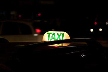 Taxi light on Paulista Avenue at night. Taxi concept. private transport concept.
