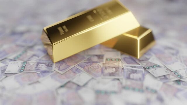 An Ingot Of Gold Lies On The Banknotes Of The Money Of English Pounds.