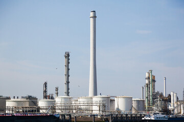Oil refinery in Amsterdam. Tanks and lines for oil storage and processing. Dutch oil industry.