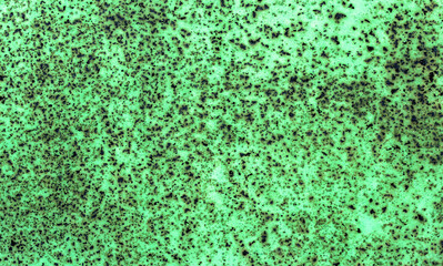 Background with green old peeling paint with rust and defects